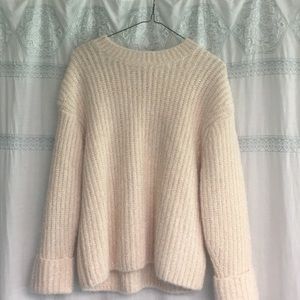 Knitted thick pink sweater